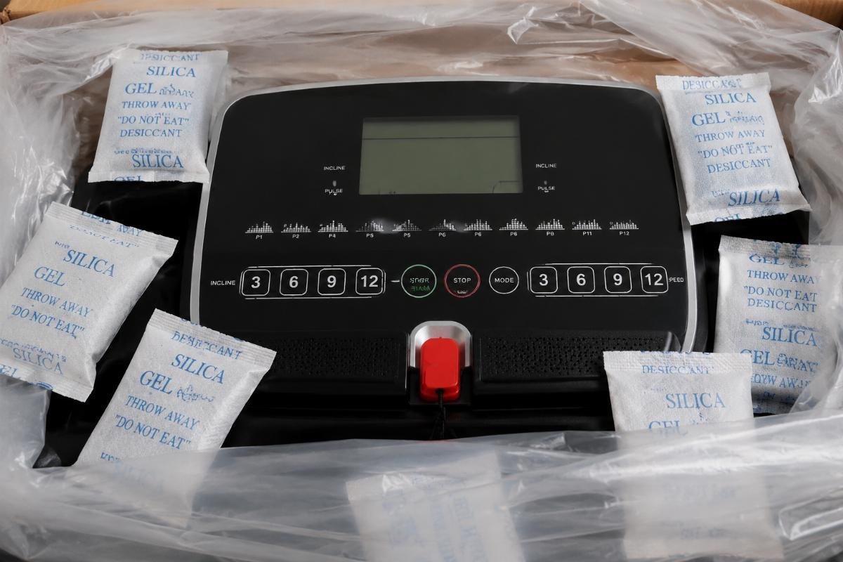 Close-up of moisture-proof packaging with desiccant packs around treadmill control board